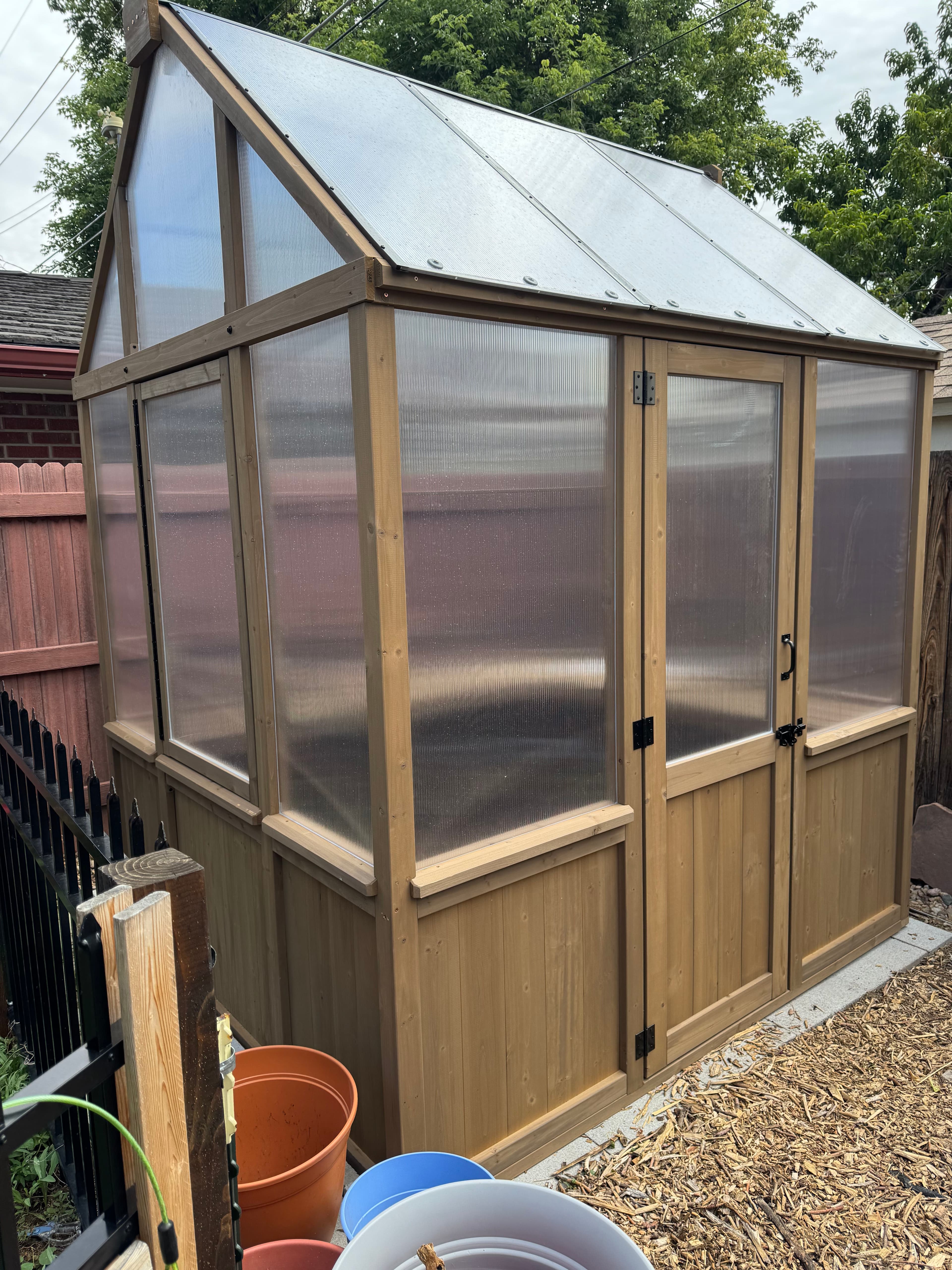 Project Custom Backyard Greenhouse Build with Wood Framing and Polycarbonate Panels image