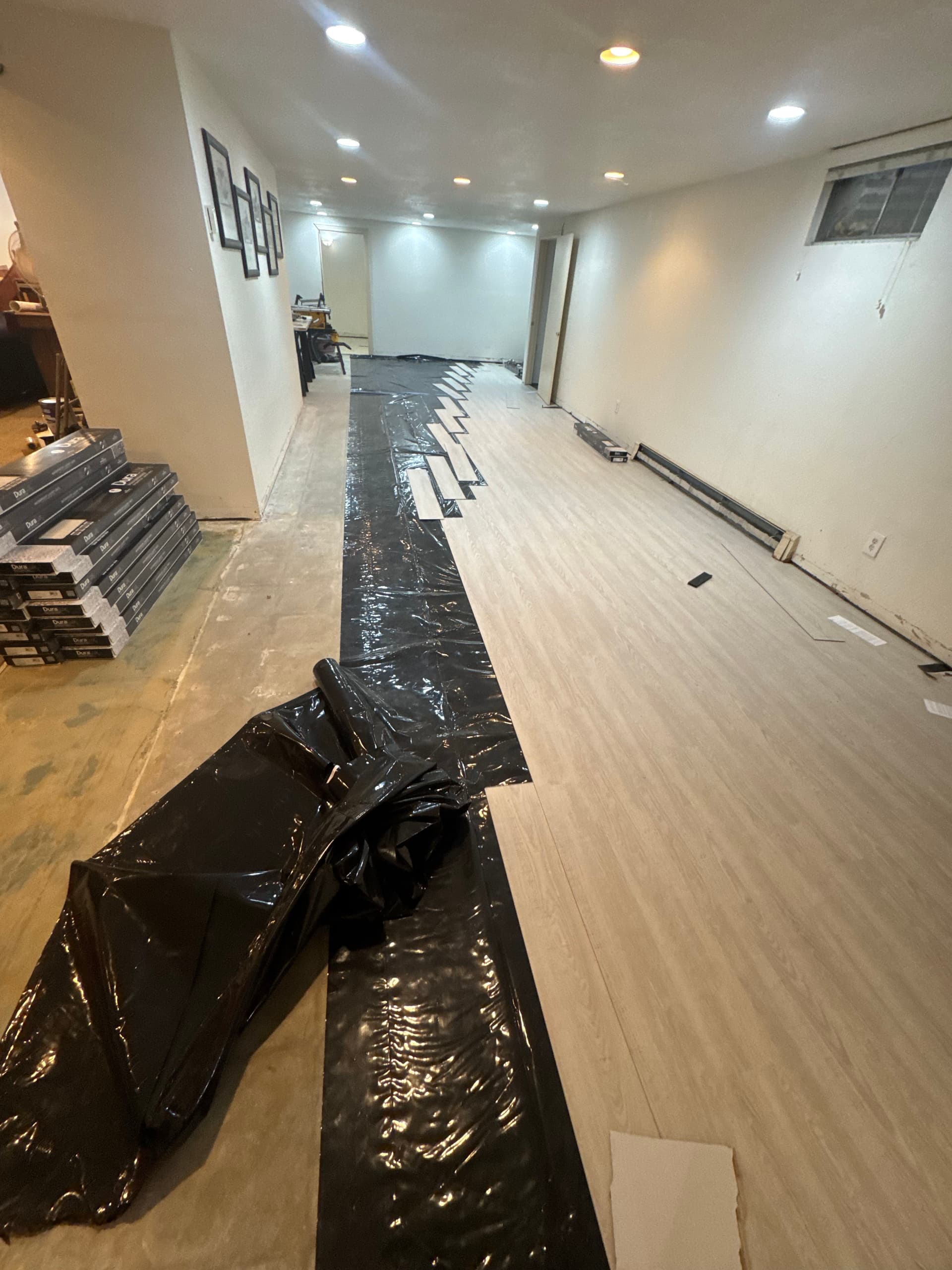 Gallery photos for 1,500 Sq Ft Basement LVP Refloor in Progress: Image #1